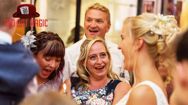 Bride laughing guest astonished at the wedding magic